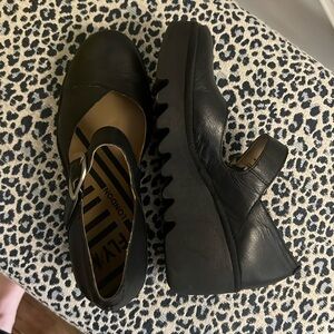 Mary Janes.  Black leather. Perfect condition